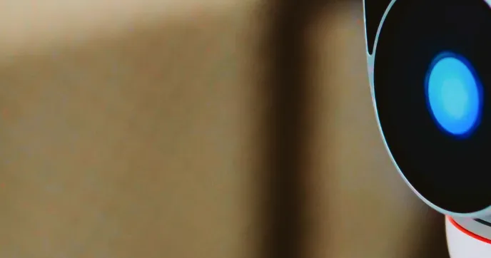 Close-up of a robotic eye with a glowing blue lens
